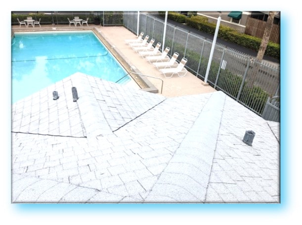 Completed pool house shingle roof overlooking community pool – Job 23-085 Pool House