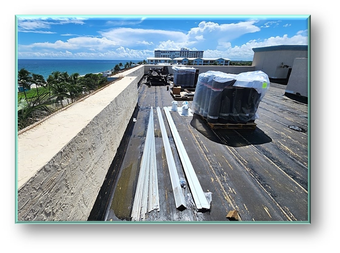 Rooftop materials staged on high-rise condo with ocean view – Job 25-019 Deerfield