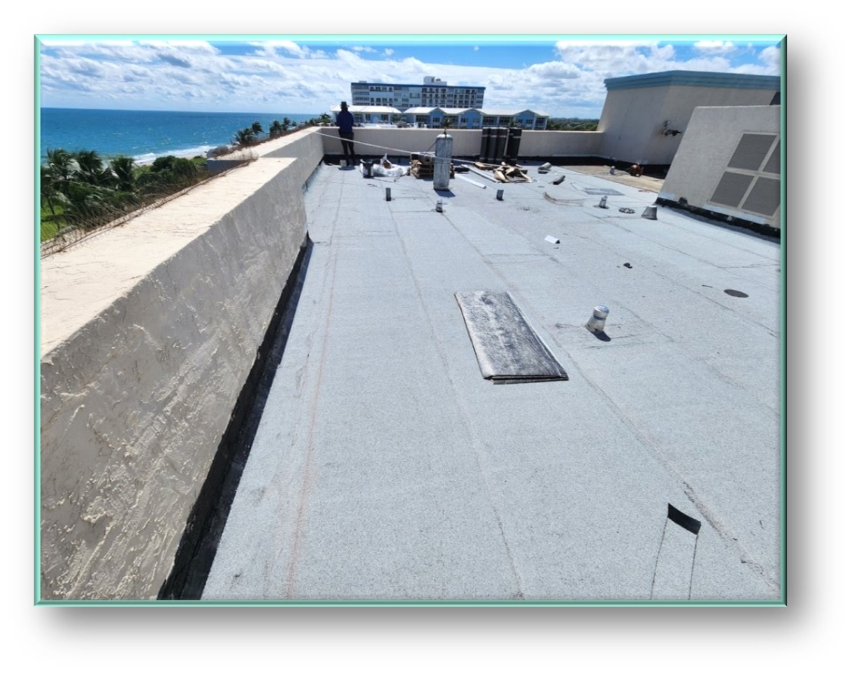 Completed flat roof membrane with ocean and resort view – Job 25-019 Deerfield