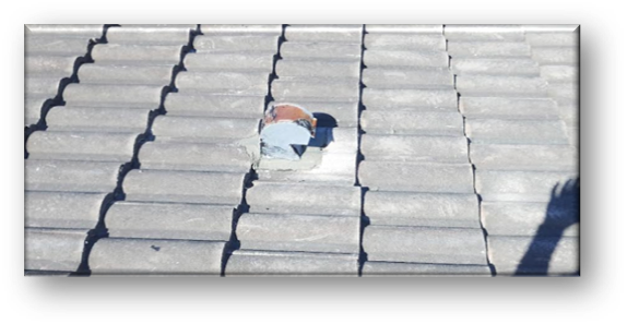 Concrete tile field with single broken tile showing hole and pipe – Job 26-098
