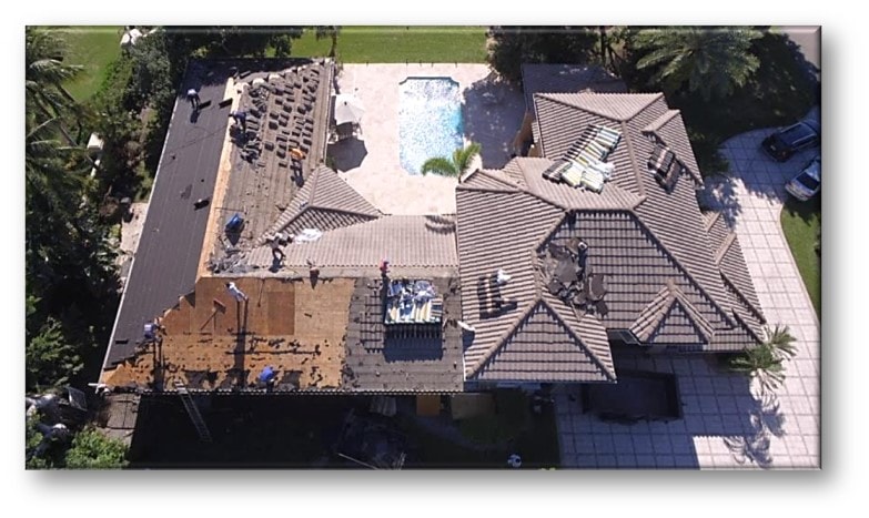 Aerial view of clay tile roof replacement in progress – Job 24-162