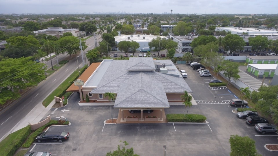 Wide aerial view of commercial concrete tile roof installation – Job 25-127