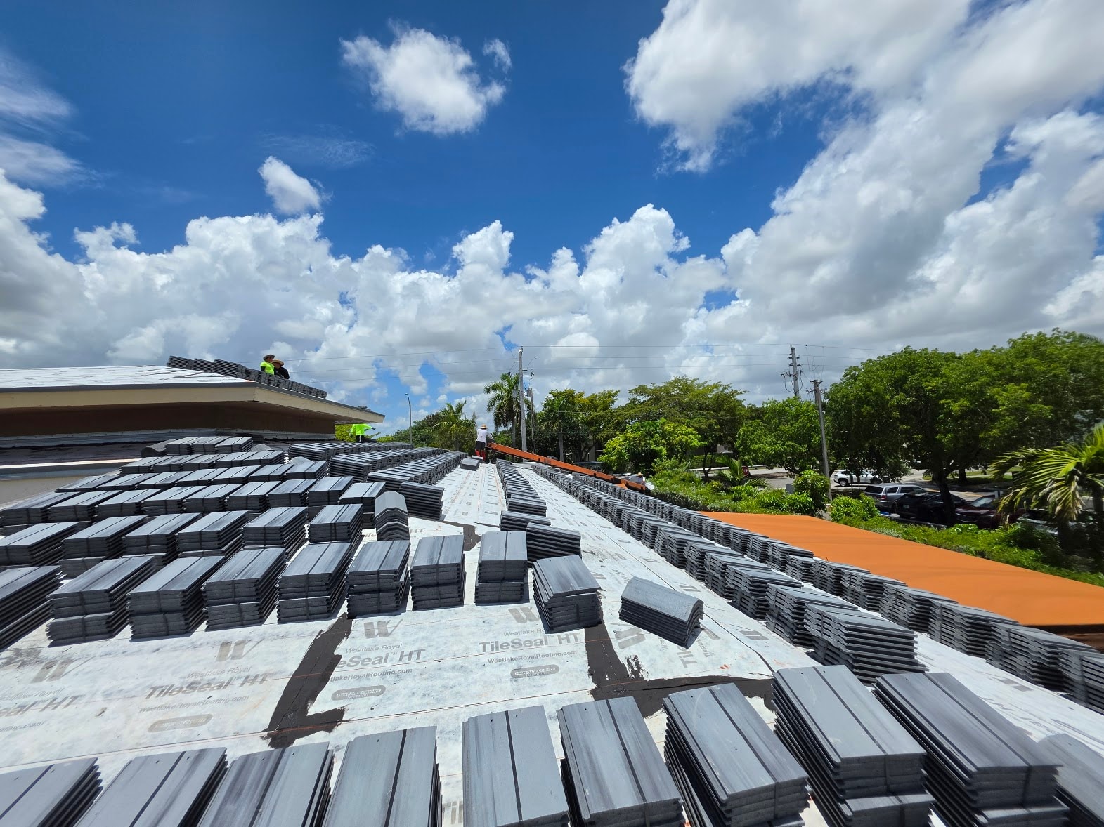 Concrete tile materials staged on roof deck – Job 25-127
